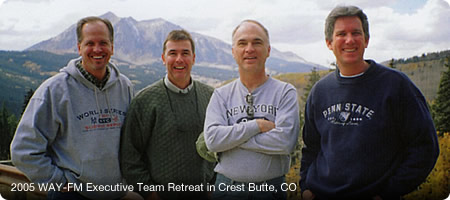 2005 Executive Team Retreat in Crested Butte, CO (left to right) COO Lloyd Parker; Senior VP Dusty Rhodes; President/Founder Bob Augsburg; CFO Dar Ringling 